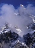 slide Alpy francuskie spowite chmurami, Le Teneverge, Cirqve Du Fer-A-Cheval, Górna Sabaudia, La Hautr Savoie