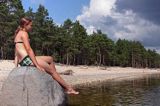 syrenka, wyspa Kihnu, Estonia, a girl on the stone, Kihnu Island, Estonia